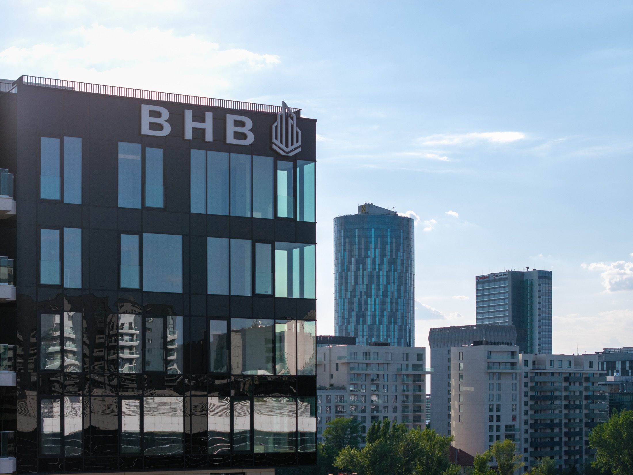 Residential development framed against the Bucharest skyline